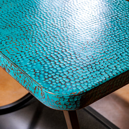 Detail of turquoise copper tabletop texture on Western accent table