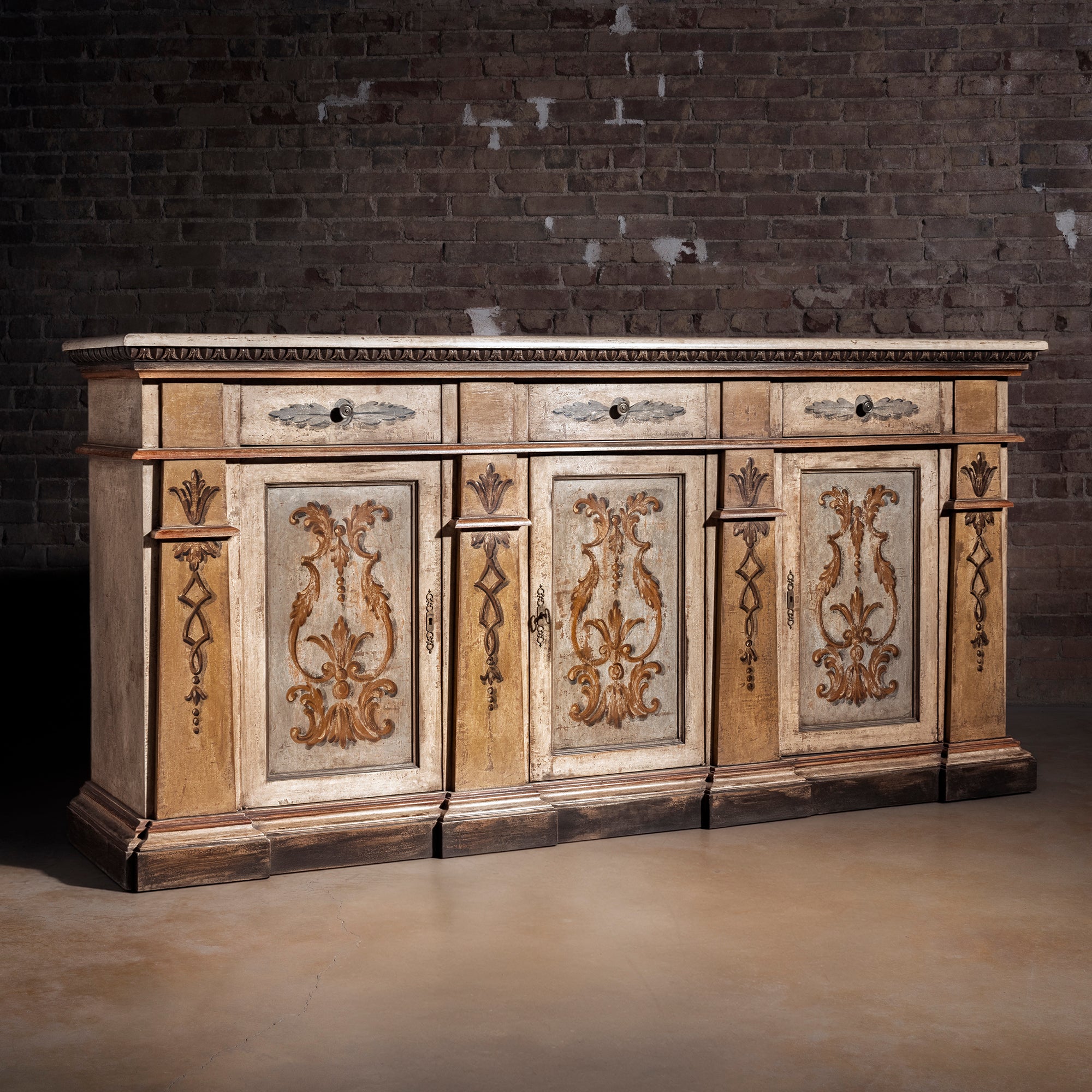 Valencia Crest Heirloom Buffet western buffet sideboard with hand-painted scroll doors, three drawers, and distressed old-world finish.