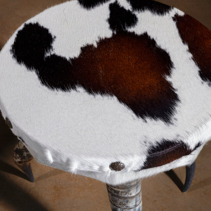 Overhead view of Vaquero Bullhorn Accent Table highlighting handcrafted cowhide pattern and western style