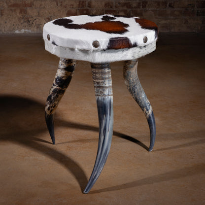 Vaquero Bullhorn Accent Table with cowhide top and authentic bullhorn legs handcrafted western decor