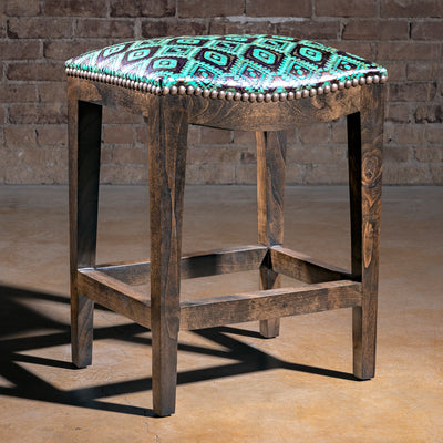 Verdigris Saddle Stool western bar stool with turquoise tooled leather seat, bronze nailhead trim, and alder wood base