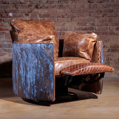 Oversized leather Western recliner with 360-degree swivel base and acid washed cowhide accents