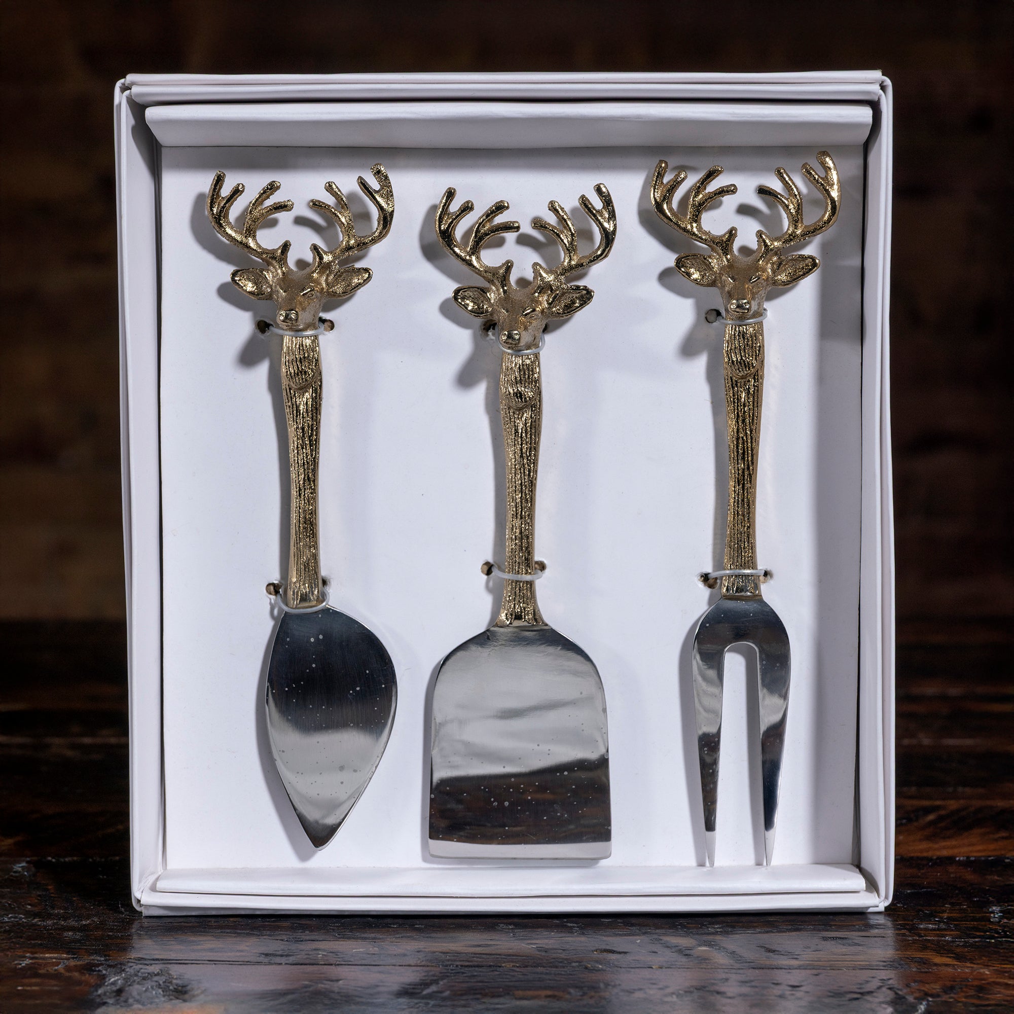 Western cheese knife set with sculpted antler handles — luxury ranch dining gift.