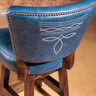 Close-up of bootstitch detail and antique nailhead trim