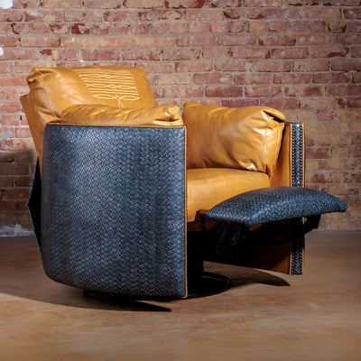 Denim Boot Stitch recliner fully reclined, showing wide leather seat and rustic detailing