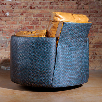Back view of handcrafted Western-style recliner with stitched leather and solid frame