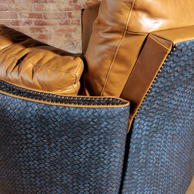 Close-up of top-grain leather and antique nailhead trim on Western leather recliner