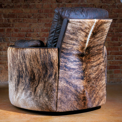 Back view of rustic Western swivel recliner with Brazilian cowhide panel
