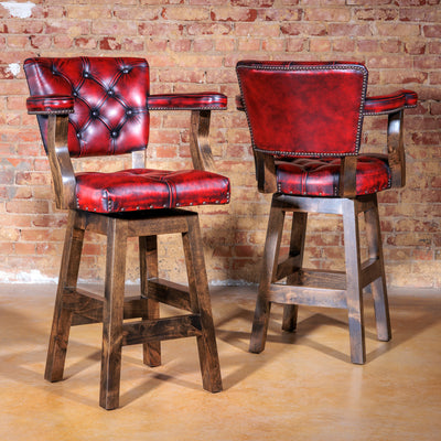 Ainsley Western bar stool with tufted backrest and hand-rubbed red leather seat – rustic handcrafted seating for bar or kitchen spaces