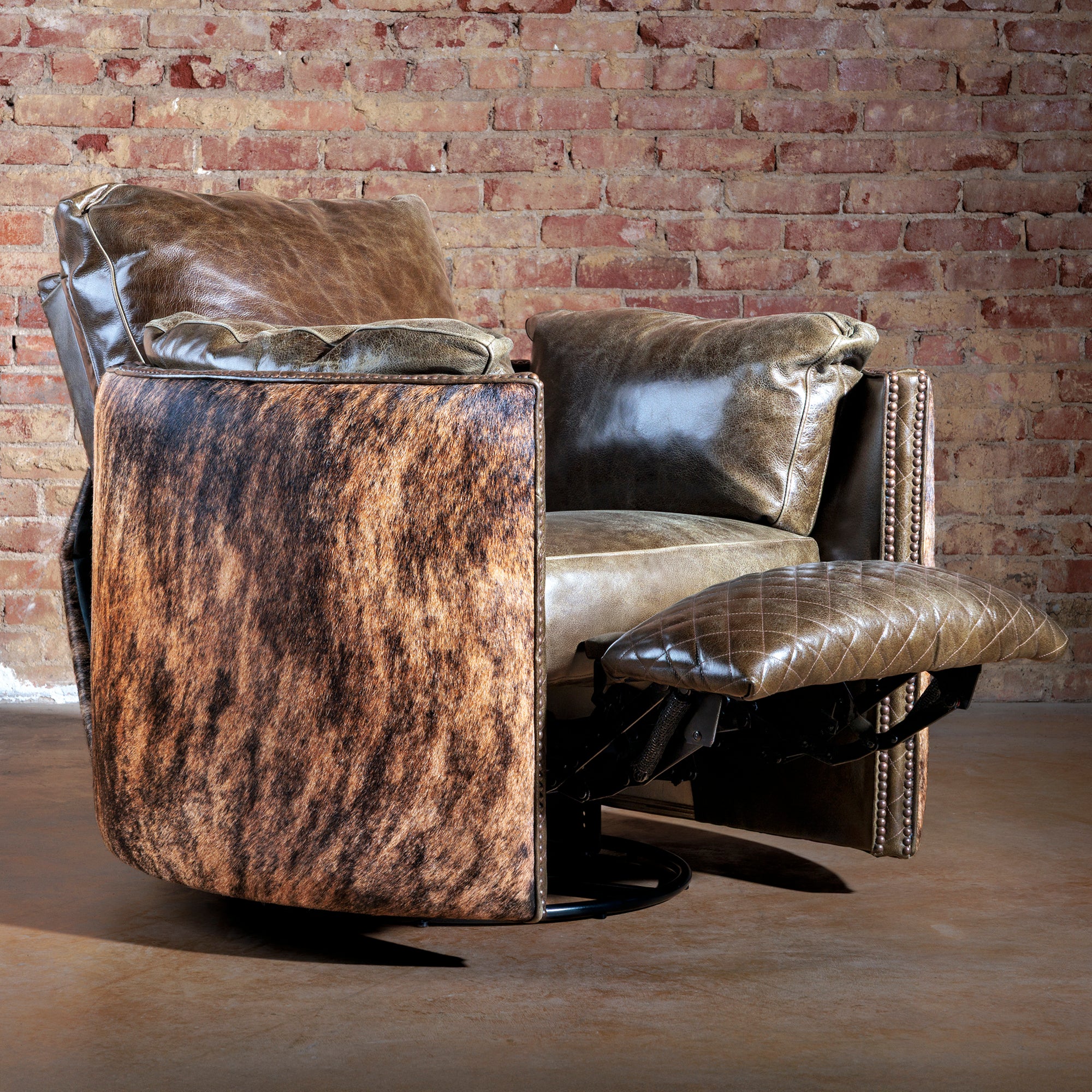 western cowhide cuddler recliner