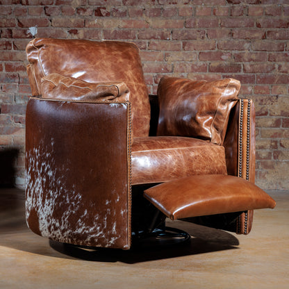 Big Texan leather recliner in push-back recline position with 360-degree swivel base and cowhide accents
