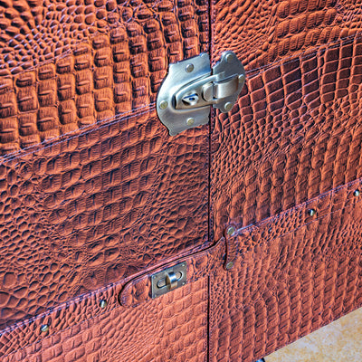 Western luxury bar cart with wine bottle storage and suede-lined cabinet lock detail