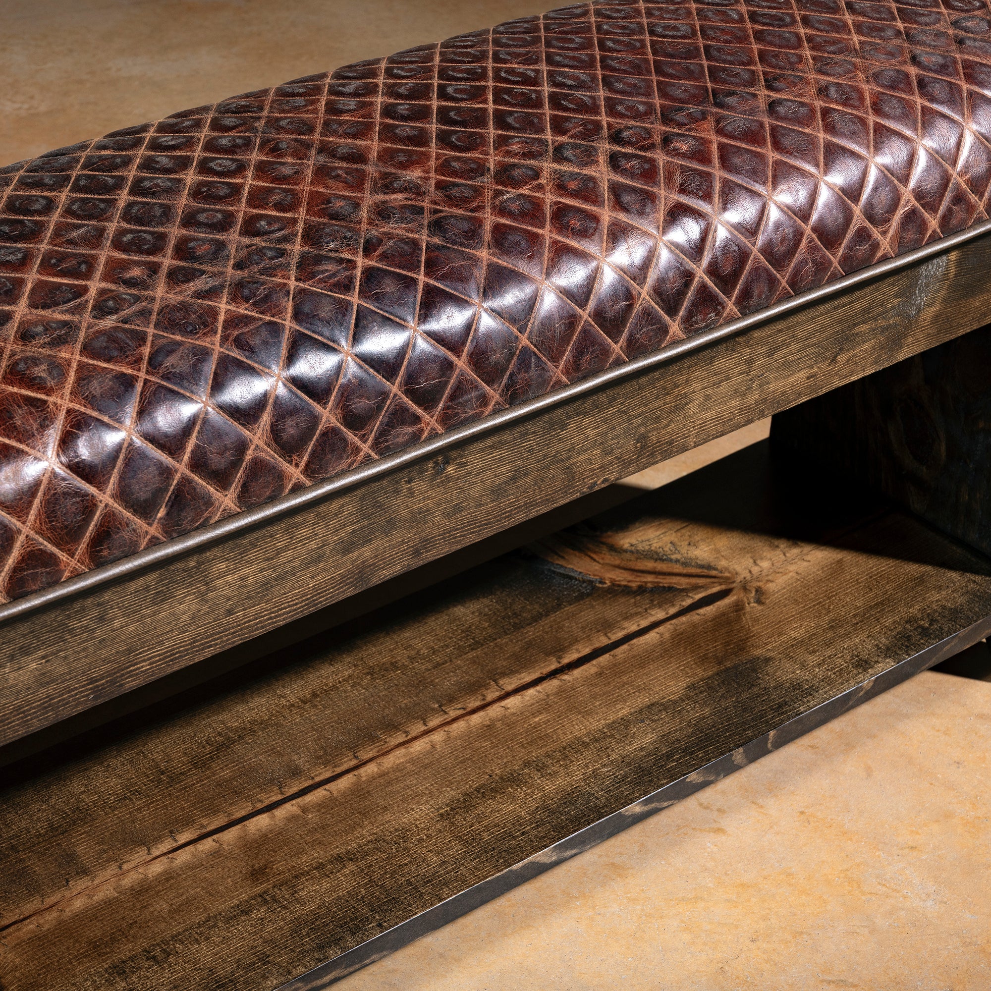 Close-up of embossed brown leather with saddle-inspired pattern