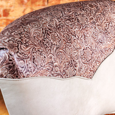 Close-up of stamped leather yoke on Western bar stool – intricate tooling on chocolate leather for rustic elegance