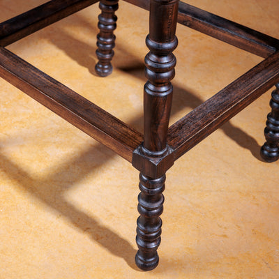 Handcrafted Western leather bar stool with nailhead trim and solid wood legs