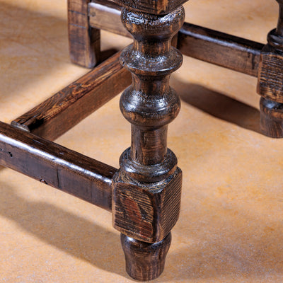 Turned hardwood leg detail of Red River Ladderback Western dining chair