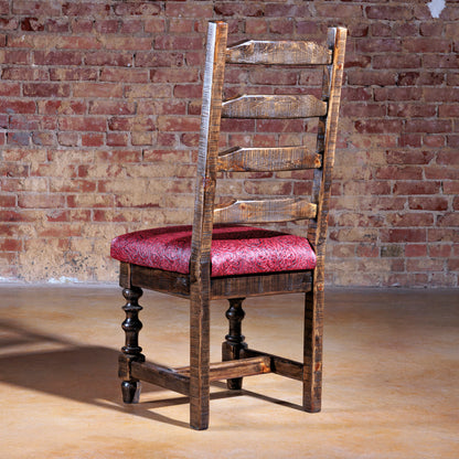 Back view of Western ladderback dining chair with red tooled leather seat