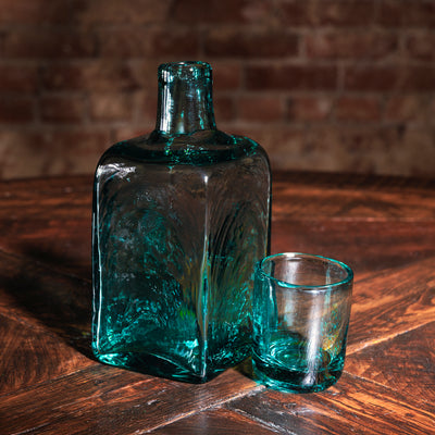 Square teal glass whiskey decanter with matching glass