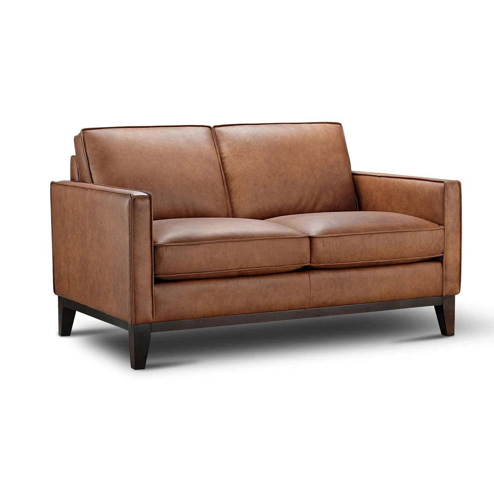 The Frisco Sofa & loveseat is 100% top grain leather and ideal for modern or western home decors. Its hardwood frame and pocketed coil seating ensure long-lasting durability and comfort. With a square arm and sleek design, this sofa provides a stylish addition to any living space.
